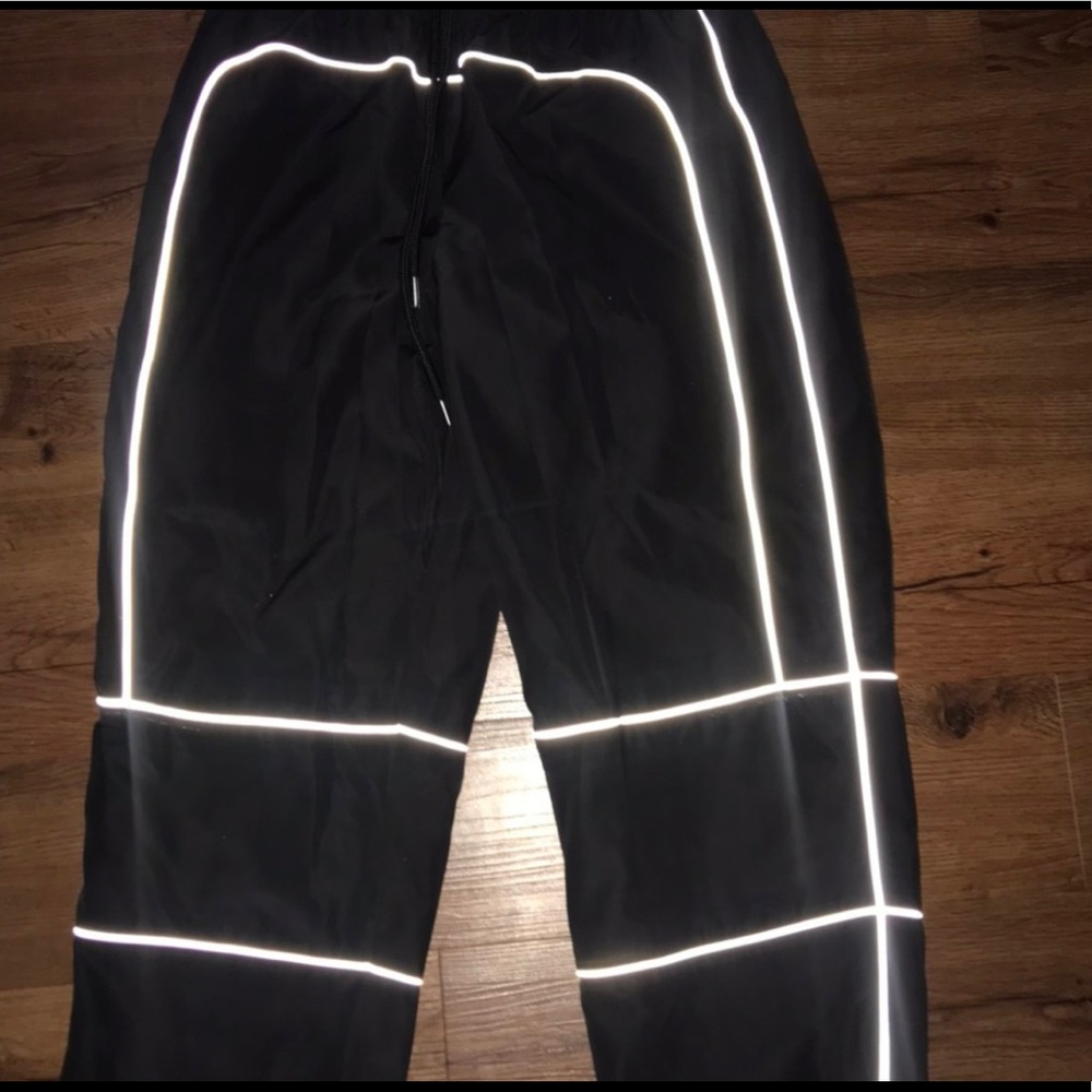 black reflective windbreaker joggers